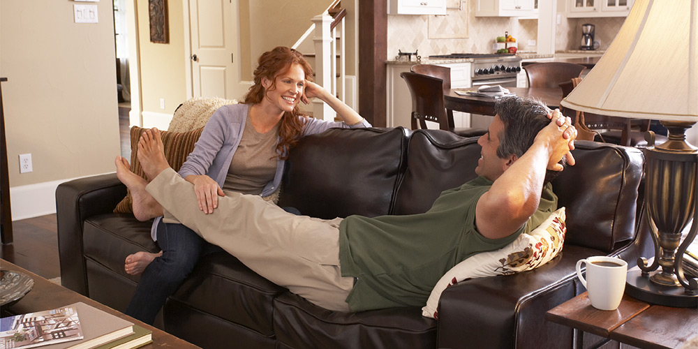 Couple On Couch Geothermal